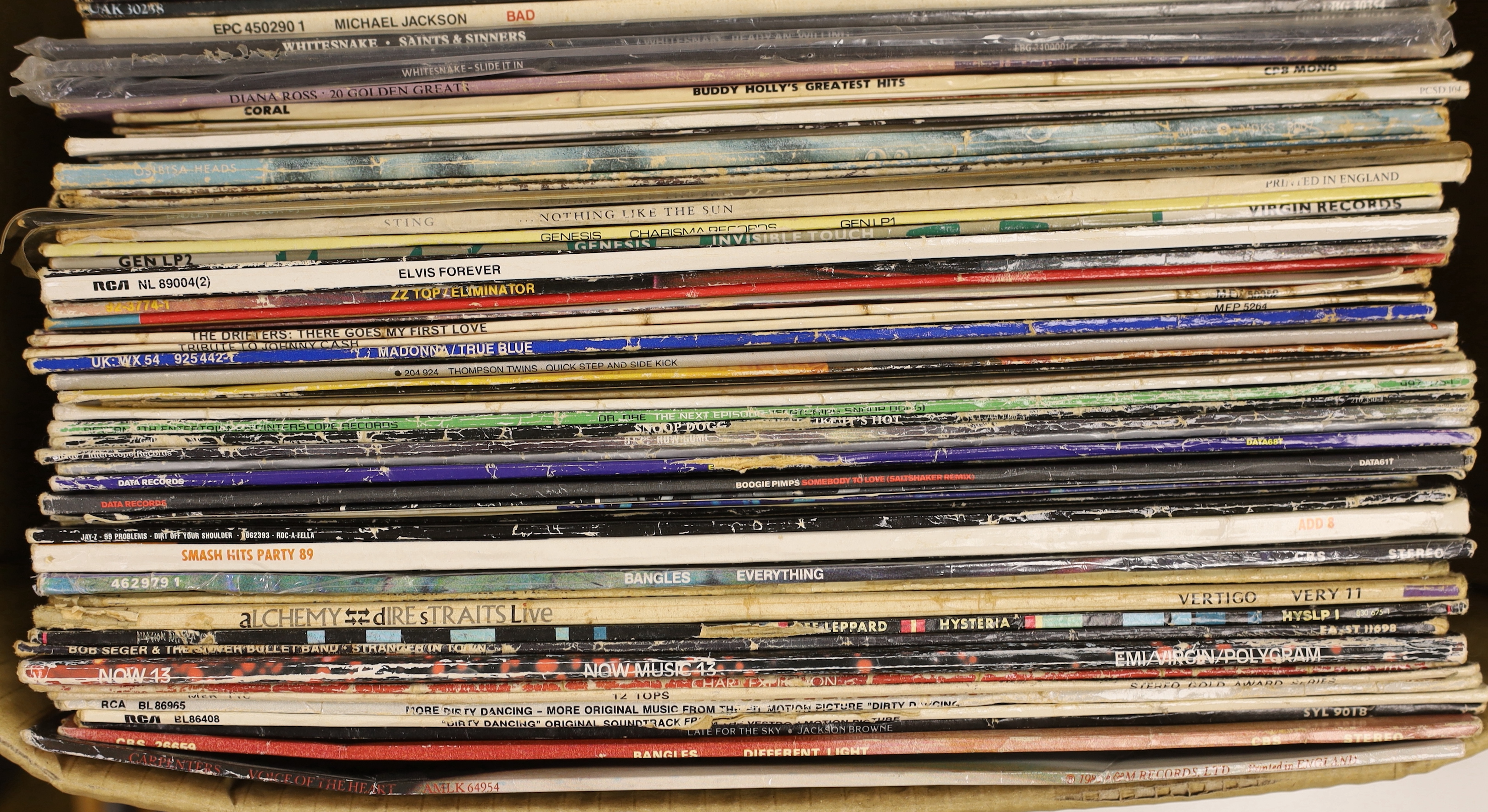 A collection of LP record albums and 12” singles (approx 50), artists include; the Beatles, Cliff Richard, Barbra Streisand, Michael Jackson, Whitesnake, Sting, Madonna, Def Leppard, Tina Turner, Leo Sayer, Ultravox, etc